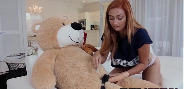  Ginger petite rides strapon teddy bear before riding cock